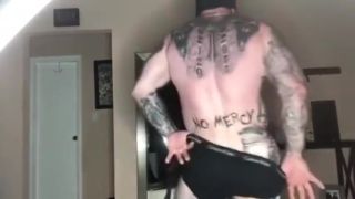 Free Petite Porn Tattooed beefy stud showing off his ass...