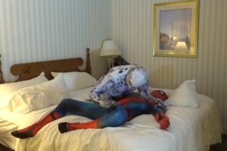 Fishnet spiderman is taken advantage of by his enemy, arachnophobia Hunk