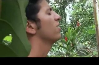 Athletic Asian gays play outdoor. Black Cock